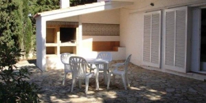  Holiday home Lobit Bajo is located in Llanca. There is a full kitchen with a refrigerator.
